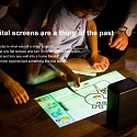 All-In-One Portable Projector Can Turn Any Flat Surface Into a Touchscreen