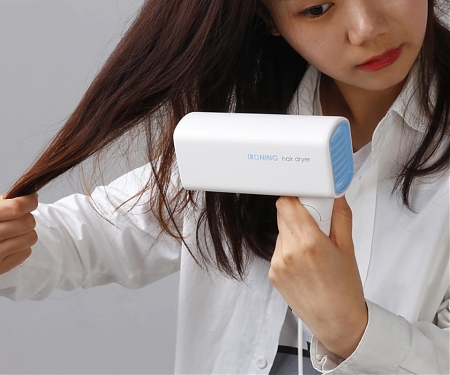 The Ironing Hair Dryer - A Handy Product for Busy Travellers