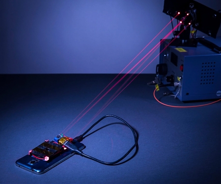 Laser System Wirelessly Charges Phones from Across the Room