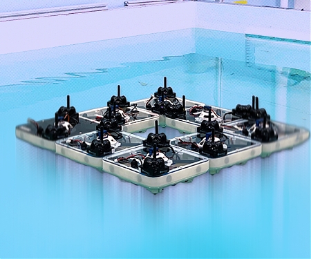 (Paper) MIT - Robotic Tiles Autonomously Lego-Snap Into Floating Smart Structures