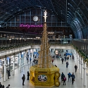 St. Pancras’ 2025 Christmas Tree Is a 12M Rotating Music Box