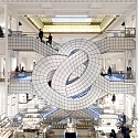 Leandro Erlich Twists Le Bon Marché's Famed Escalator Into Pretzel-like Form