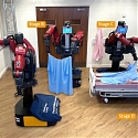 (Paper) Robotic Nurse Can Dress a Mannequin in a Hospital Gown