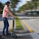 The Zipper Electric Kick Scooter Folds Down With A Push of Button